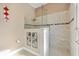 Bathroom shower with glass enclosure and neutral color scheme at 1032 Ventura Dr, Lady Lake, FL 32159