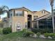 Stunning two-story home featuring a water fountain, lush landscaping and a beautiful walkway to the front door at 1096 Linkside Ct, Apopka, FL 32712