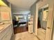 View of bathroom to bedroom at 113 Temple W Cv, Leesburg, FL 34748