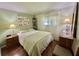 Bedroom with wood floor at 113 Temple W Cv, Leesburg, FL 34748