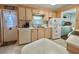 Functional kitchen offers plentiful cabinet space, modern appliances, and great natural light for a delightful cooking at 113 Temple W Cv, Leesburg, FL 34748