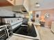Well-equipped kitchen showcases modern appliances, sleek countertops, and functional design, perfect for culinary enthusiasts at 113 Temple W Cv, Leesburg, FL 34748
