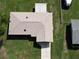 Aerial view of home showing roof, driveway, and well-maintained landscaping at 11681 Se 72Nd Court Rd, Belleview, FL 34420