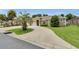 Charming single-Gathering home with well-maintained landscaping and an inviting entrance at 12407 Ne 48Th Loop, Oxford, FL 34484