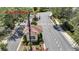 Image of the front gate and guard house to a well-manicured neighborhood at 12407 Ne 48Th Loop, Oxford, FL 34484