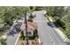 Image of the front gate and guard house to a well-manicured neighborhood at 12407 Ne 48Th Loop, Oxford, FL 34484