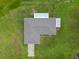 Aerial view shows roof and rectangular layout of home with surrounding lawn at 14325 Manchester Ave, Groveland, FL 34736