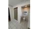 Bathroom featuring a glass door shower and private toilet area at 17329 Se 115Th Ter, Summerfield, FL 34491