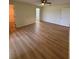 Bedroom with wood floors and walk-in closet at 17329 Se 115Th Ter, Summerfield, FL 34491