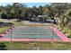 Active shuffleboard area with benches and well-maintained courts at 1855 Stacey Dr, Mount Dora, FL 32757
