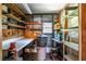 Organized workshop space with workbench, shelving, and storage solutions at 1855 Stacey Dr, Mount Dora, FL 32757