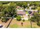 Aerial shot of the house and yard showcasing the deck and screened porch at 2389 Grand Poplar St, Ocoee, FL 34761
