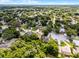 Elevated view of the property highlighting its location among mature trees and within a well-kept neighborhood at 2389 Grand Poplar St, Ocoee, FL 34761