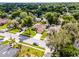 An overhead view displaying the property with its lush landscaping and surroundings within a well-established neighborhood at 2389 Grand Poplar St, Ocoee, FL 34761