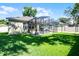 Picture of backyard, showcasing patio and expansive grassy area at 2389 Grand Poplar St, Ocoee, FL 34761