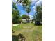 Quaint home with a fresh lawn and mature trees at 2611 Hiawatha Ave, Sanford, FL 32773