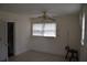 Cozy living room featuring neutral walls, tile floors, window with blinds and a ceiling fan at 2611 Hiawatha Ave, Sanford, FL 32773