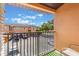 View from the balcony showing the parking lot and the apartment building at 2717 Bushman Dr, Kissimmee, FL 34746