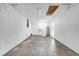 Unfinished basement features high ceilings, utility sink, and ample space for storage or recreation at 302 W Rose Ln, Lady Lake, FL 32159
