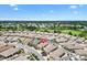 Beautiful aerial view of the property featuring a view of a golf course and the community at 3105 Carrollton Ct, The Villages, FL 32162