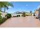 Spacious backyard with privacy fence and a screened-in pool area, perfect for outdoor living at 3105 Carrollton Ct, The Villages, FL 32162