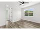 Bright bedroom with natural light and modern ceiling fan at 321 Watershore Dr, Leesburg, FL 34748
