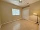 Bedroom with ceiling fan, window with blinds, and laminate flooring at 3416 Capland Ave, Clermont, FL 34711