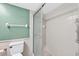 Bathroom featuring beadboard paneling and a glass-enclosed shower stall at 35338 Lake Unity Rd, Fruitland Park, FL 34731