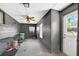 Functional bonus room space with neutral walls, a ceiling fan, and dog kennels at 35338 Lake Unity Rd, Fruitland Park, FL 34731