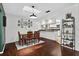 Comfortable dining room featuring hardwood floors and an open concept at 35338 Lake Unity Rd, Fruitland Park, FL 34731