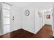 Entryway featuring a wooden floor and a view down a hallway at 35338 Lake Unity Rd, Fruitland Park, FL 34731