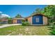 Lovely single-story brick house showing trimmed shrubbery and a well-maintained lawn at 35338 Lake Unity Rd, Fruitland Park, FL 34731