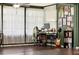 Bright home office with a large window, comfortable chair, and ample storage at 35338 Lake Unity Rd, Fruitland Park, FL 34731
