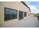 Exterior balcony shot with sliding glass door entry and outdoor views at 36914 Bee Meadow Ct, Eustis, FL 32736