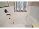 Close up of the bathroom tub and shower combination at 36914 Bee Meadow Ct, Eustis, FL 32736