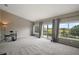 Upstairs bonus room featuring great windows and a sliding glass door to the balcony at 36914 Bee Meadow Ct, Eustis, FL 32736