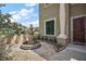 Inviting front yard featuring a charming fountain and lush landscaping enhancing curb appeal at 36914 Bee Meadow Ct, Eustis, FL 32736