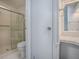 Bathroom features a shower, toilet, and vanity area in a compact design at 601 Jason Dr, The Villages, FL 32159