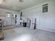Garage space with washer/dryer, sink, and ample storage at 601 Jason Dr, The Villages, FL 32159