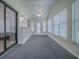 Open living space with plenty of natural light, and built-in shelving at 601 Jason Dr, The Villages, FL 32159