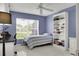 Bedroom featuring a bright window and natural light, a single bed, tile flooring, and book shelf at 670 Fayette Ct, The Villages, FL 32162