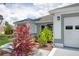 Exterior shot of a home showcasing well-maintained landscaping at 670 Fayette Ct, The Villages, FL 32162