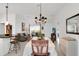 Open-concept area with living, dining, and kitchen; great for entertaining at 670 Fayette Ct, The Villages, FL 32162