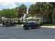 Well maintained parking lot with a modern car parked in one of the designated spots at 670 Fayette Ct, The Villages, FL 32162