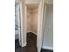 Walk-in closet with ample shelving and tile floors at 711 Sugar Bay Way # 115, Lake Mary, FL 32746