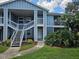 Apartment building exterior featuring multiple units and outdoor staircases at 711 Sugar Bay Way # 115, Lake Mary, FL 32746