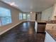 Open-concept living area featuring tile floors and an abundance of natural light at 711 Sugar Bay Way # 115, Lake Mary, FL 32746