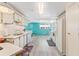 Functional kitchen featuring modern appliances, ample countertop space and a seamless connection to the living area at 717 W Coach N Four Dr, Leesburg, FL 34748