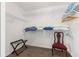 Walk-in closet with metal shelving for storage of clothing and accessories at 804 Santa Rita Way, Lady Lake, FL 32159