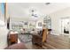 Inviting living room with vaulted ceilings, large windows, and comfortable seating at 804 Santa Rita Way, Lady Lake, FL 32159